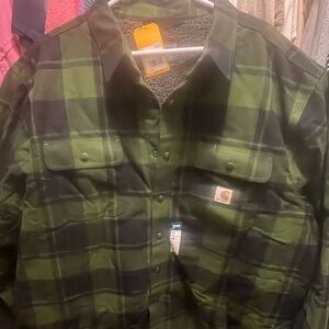 Carhartt Sherpa lined flannel Jacket 2xL tall, never worn still has tags on it.